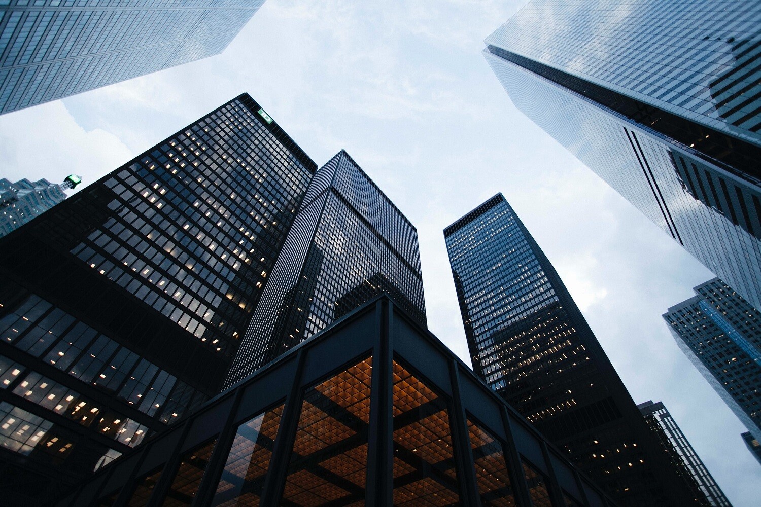 An image of a city skyline. The skyscrapers representing the Commercial sector.